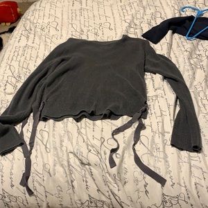 Gray long sleeve sweater with side slits and ties